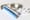 Two GLP-1 injector pens alongside insulin cartridges and a body measuring t