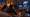 A couple sits on a couch in a warmly lit living room at night, seen from behind as they watch a large smart TV glowing in front of them.