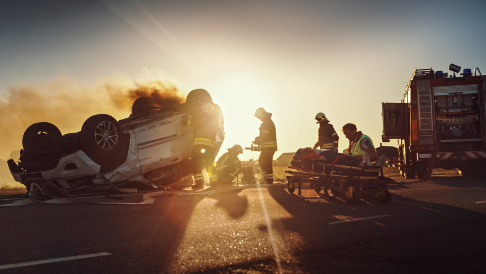 Paramedics and Firefighters Rescue Injured Trapped Victims from car accident