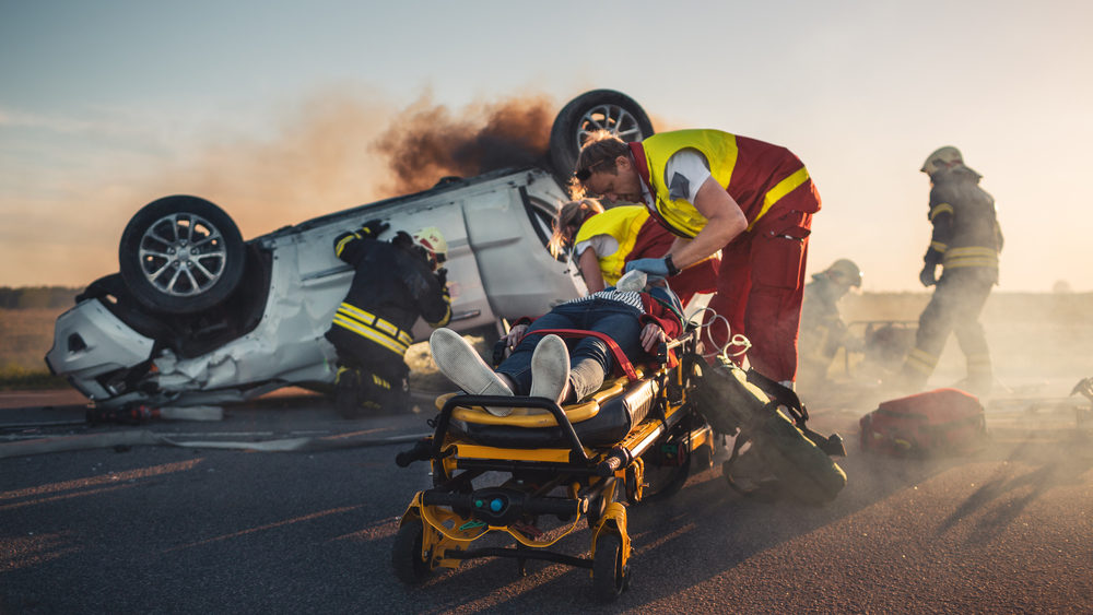 Paramedics Save Life of a Female Victim Lying on Stretcher