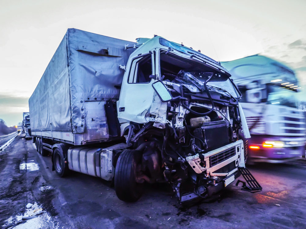 Cabin of tractor trailer damaged after accident