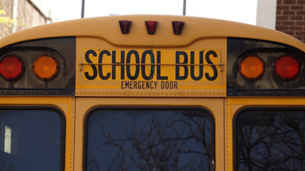 Close-up of the rear of a yellow school bus