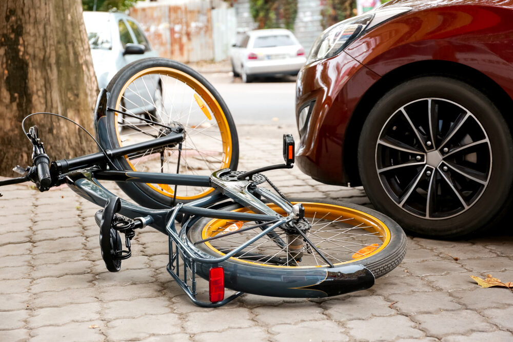 Bicycle Crash Involving Hit-and-Run Driver at Pesante Road Intersection in Bakersfield Accident between car and bicycle on city street