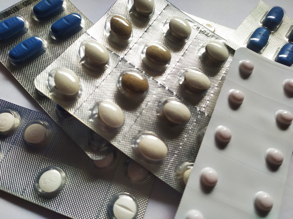 Safe Driving and Your Prescription Medication a set of anti-inflammatory, antibiotic, antidepressant and antipsychotic drugs in capsules, pills and blisters