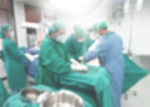  blur background of medical team performing cesarean section in operating room at hospital.