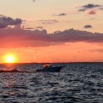 a boat crossing the sunset in Sandusky bay On Lake Erie