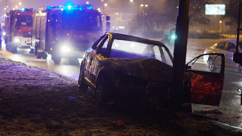  burned car after heavy collision.