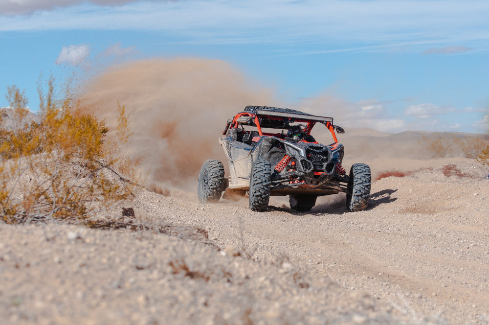Can-Am Maverick X3 ripping through the desert turn as it explores the local terrain
