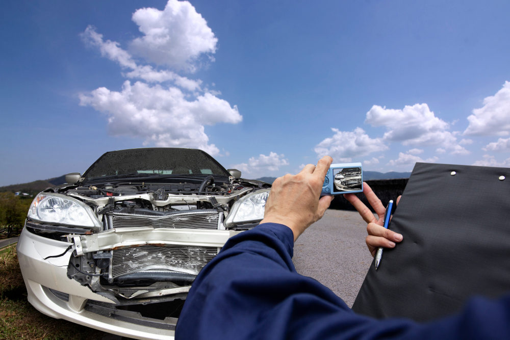 Financial Compensation for Lost Wages in a Virginia Car Accident The surveyor photographed car accidental damage with a camera