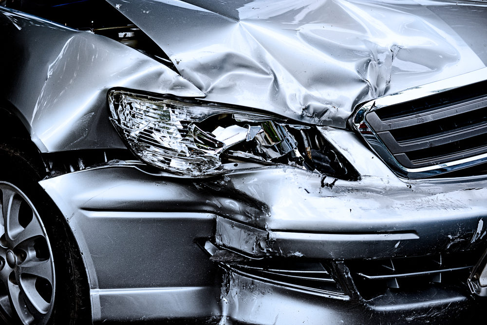 Front end of a sliver automobile crashed 