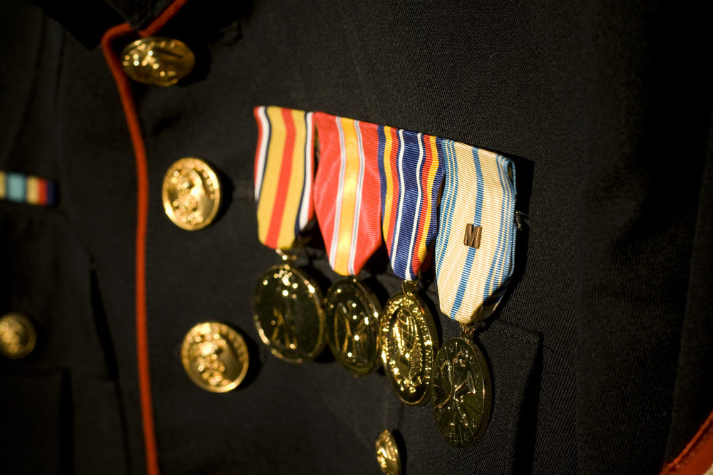 closeup of a u.s. marines medals on dress uniform