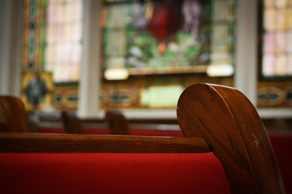 Church pews with a bit of cloth backing on them at the 16th Street Baptist Church in Birmingham, Alabama