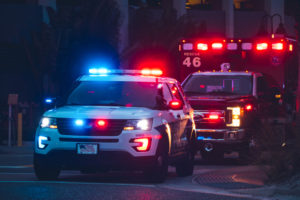 American Police Car and Emergency truck with Blue and red lights.