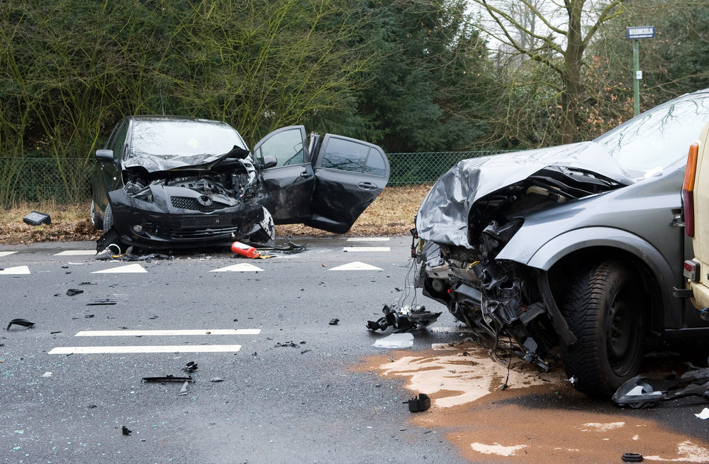 two vehicles after a collision on an interstate