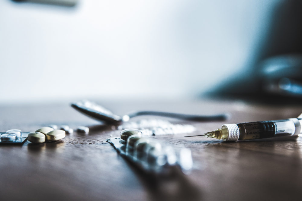 Drugs on a table ready for abuse.