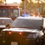Police, fire, and paramedic units respond to the scene of an emergency.