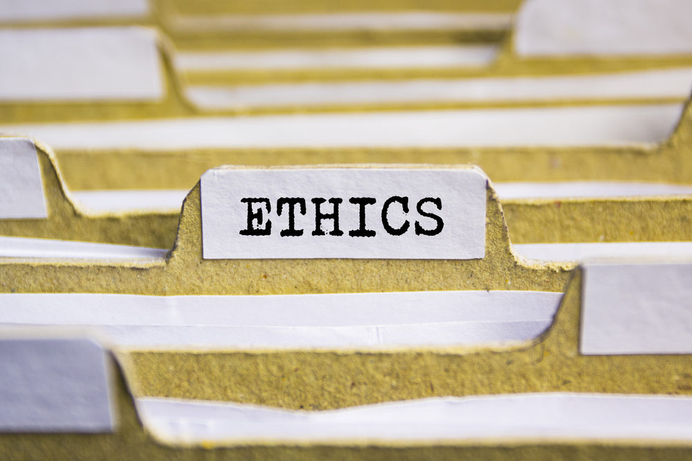 Ethics word on card index paper