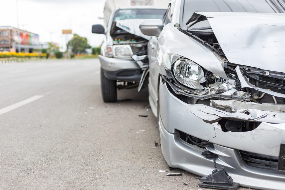 frontal view of two vehicles after an accident