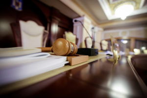 gavel on desk in courtroom