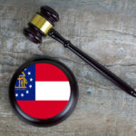 Wooden judgement or auction mallet with of Georgia flag