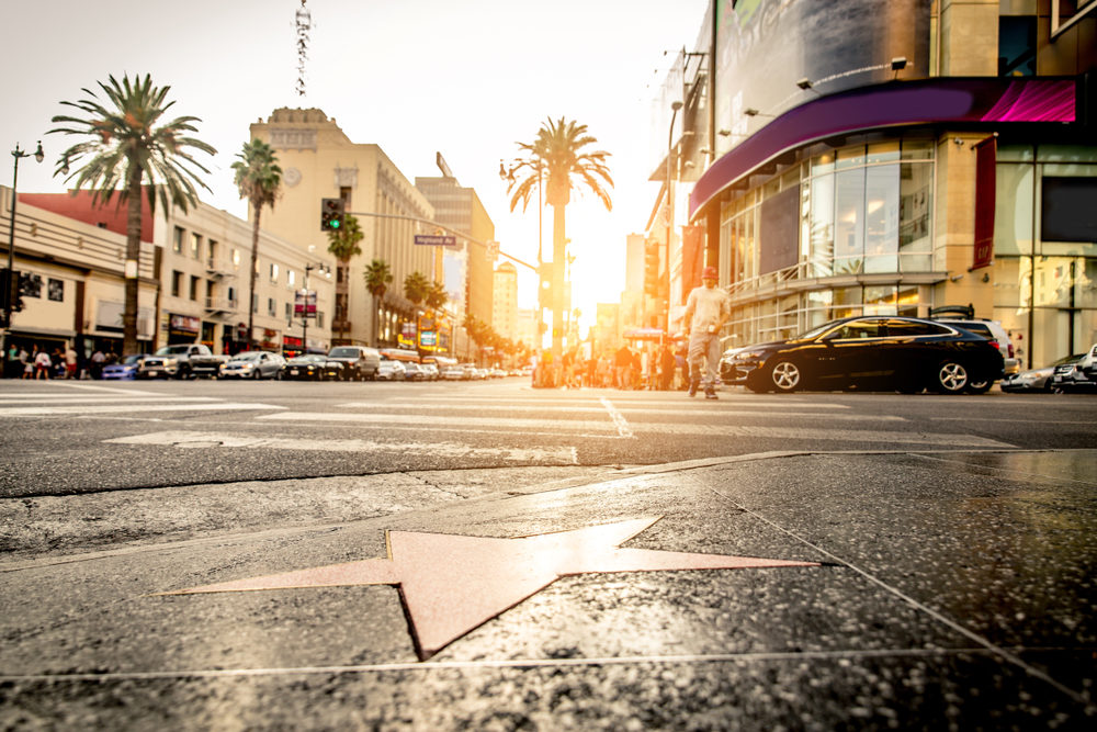 Close-up of a star on the Walk of Fame with Hollywood Boulevard in the background
