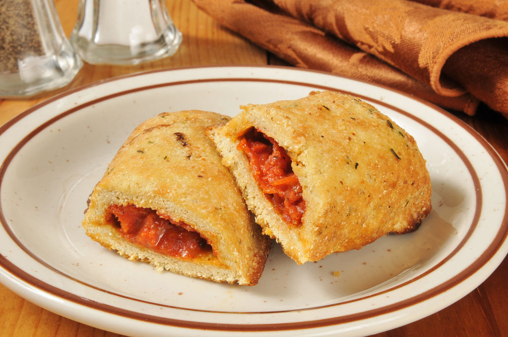 Hot Pockets Recalled for Risk of Glass, Hard Plastic Hot pizza rolls or pockets broken open on a plate