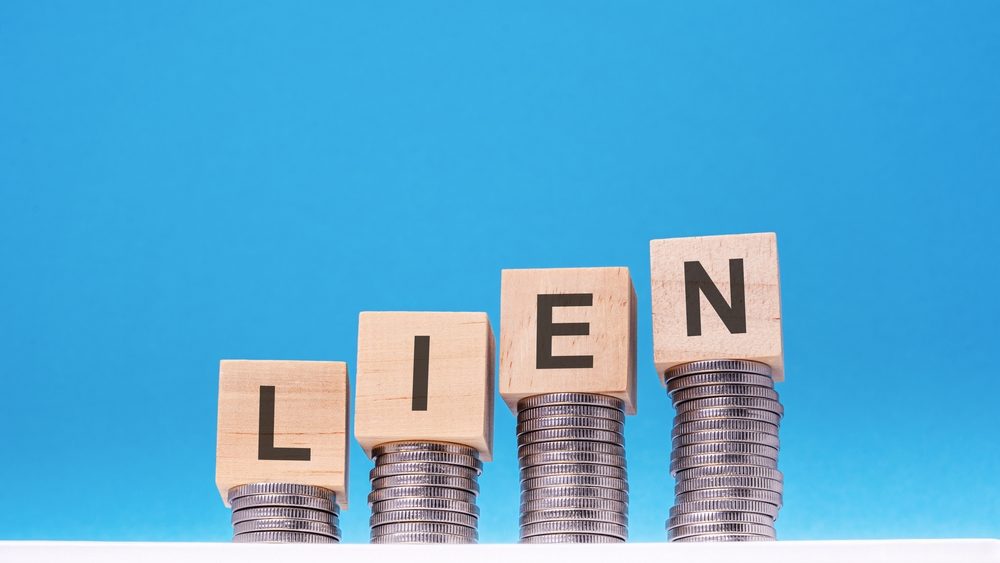 Health Insurance Subrogation: Unraveling its Impact on Injured Parties and Navigating Subrogation Vendors lien - text on wood blocks stack with coin