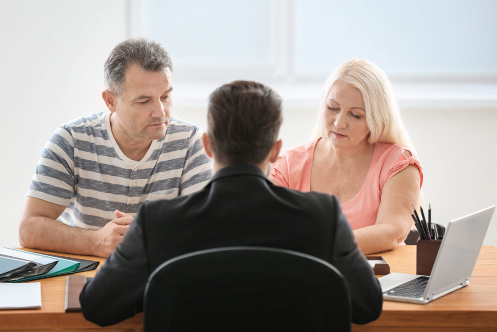 Mature couple at notary public office