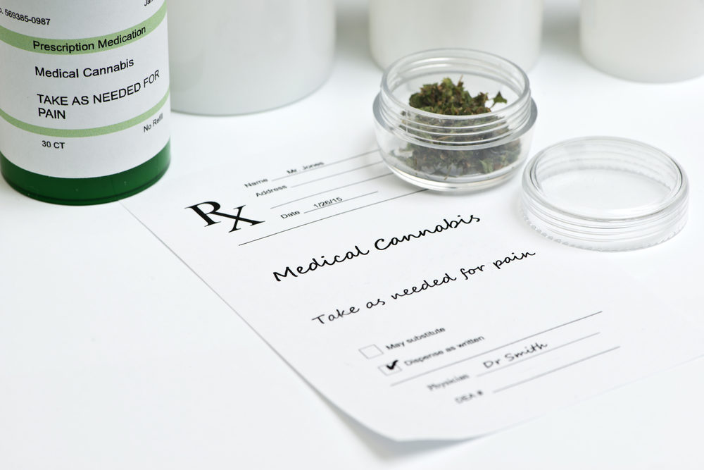 Medical marijuana with prescription bottle, container and lid