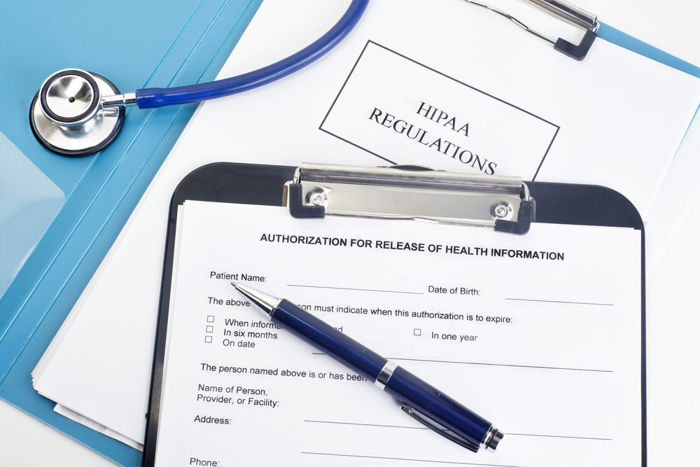 Patient release of information form with HIPAA regulations and documents