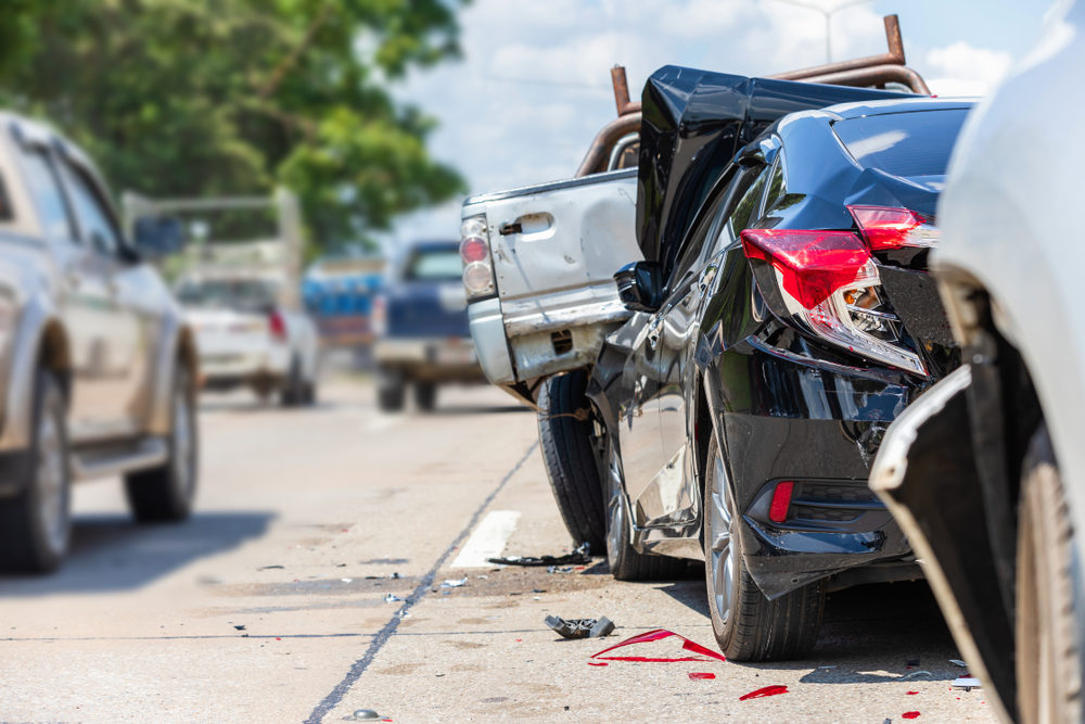 Modern car accident involving many cars on the road