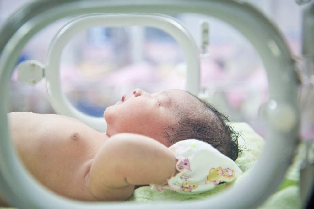 New Research May Help Determine Infant Brain Bleeds newborn baby in incubator care at nursery
