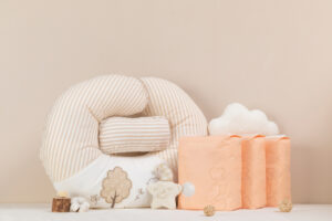 a display of nursing pillows against a cream colored wall