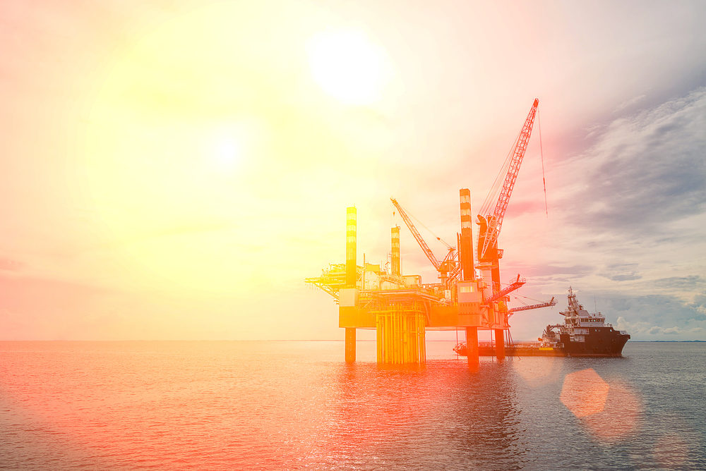 Who Is at Fault for the Seacor Power Lift Boat Accident? Oil platform or rig platform in sunset or sunrise time.