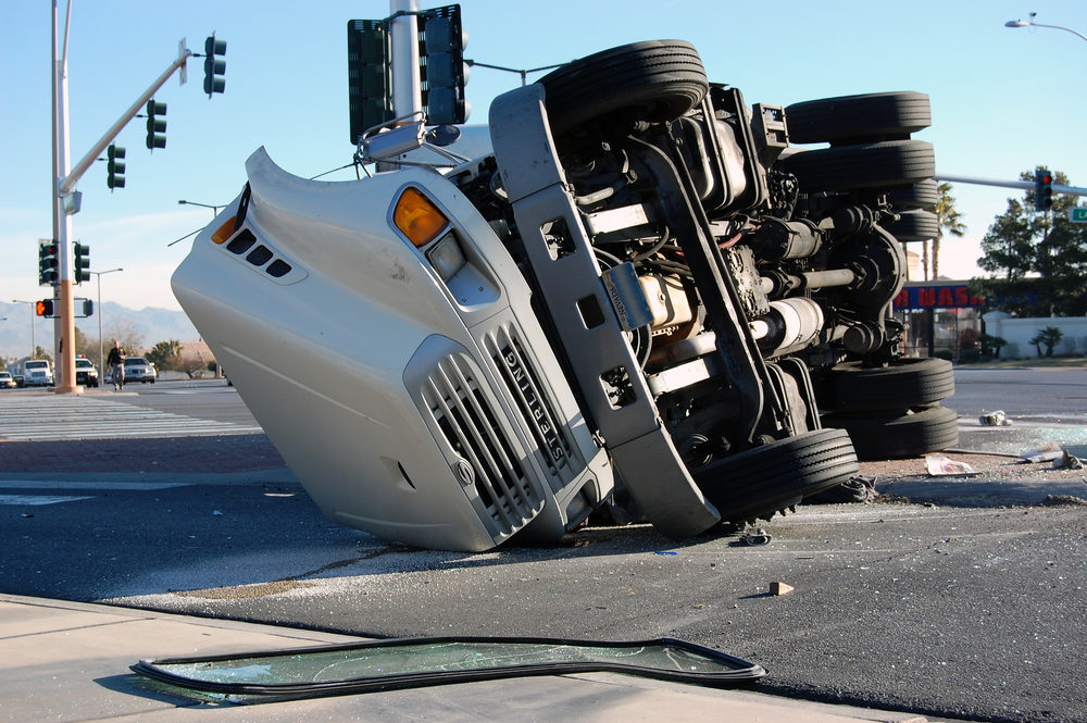 overturned semi truck in intersection