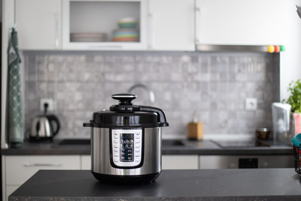 modern multi cooker on counter in a kitchen