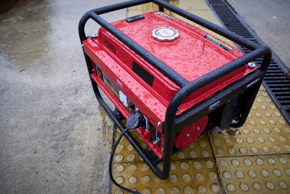 Electric generator, used in the rain on the ground.