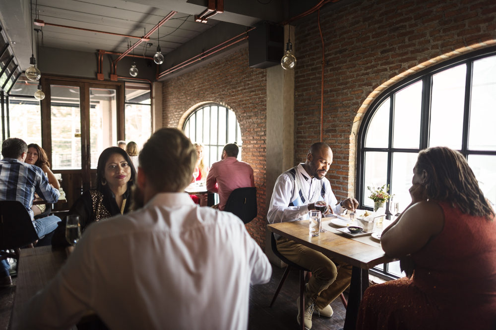 restaurant dining room with customers eating