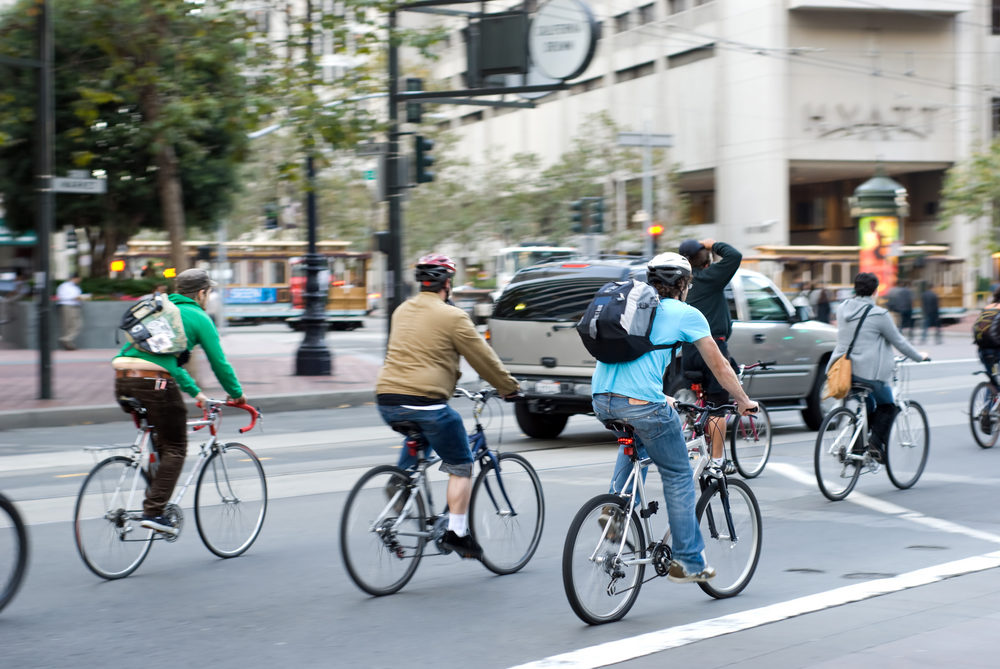 bikers in traffic in San Francisco, California