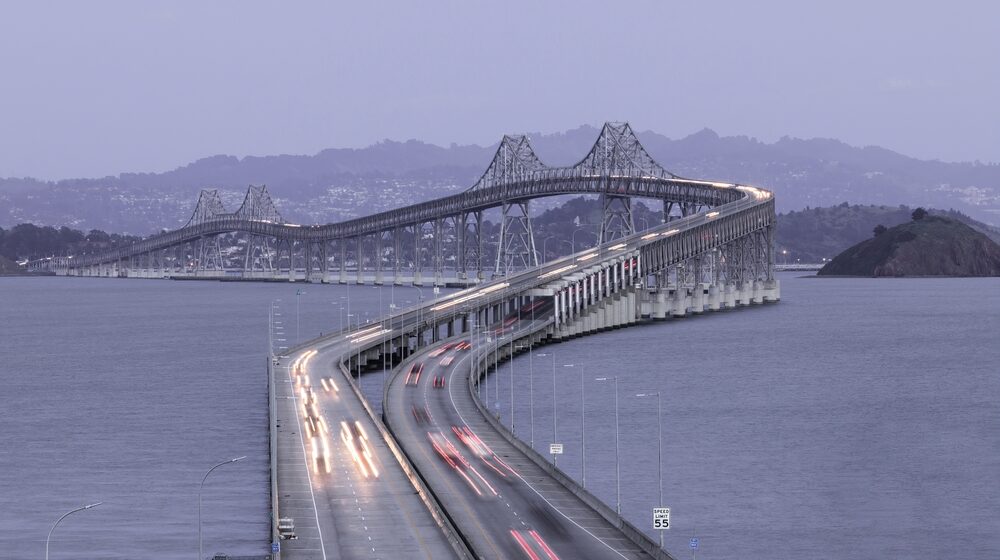 traffic blurred on the san rafael bridge in marin county, california at dusk