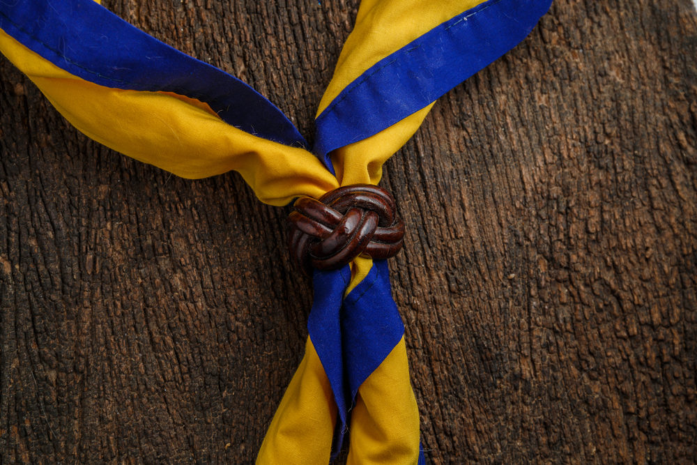 Close-up of a blue and yellow boy scout scarf