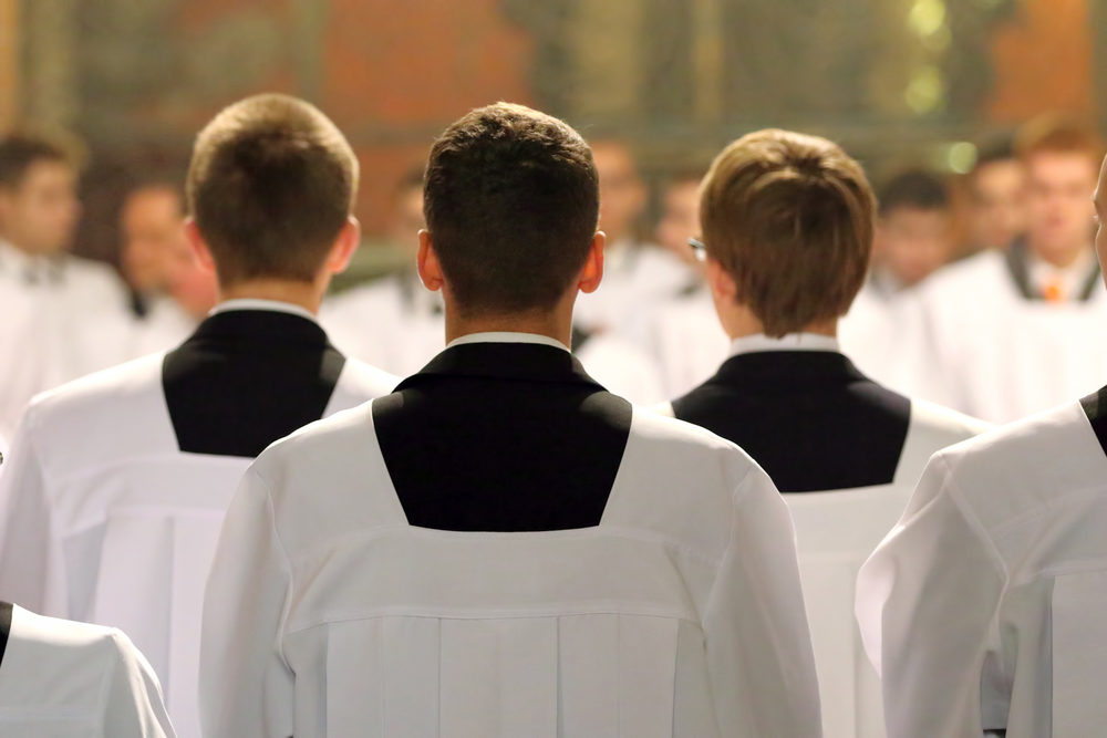 The young clerics of the seminary during Mass