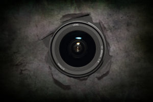 Hidden camera lens exposed