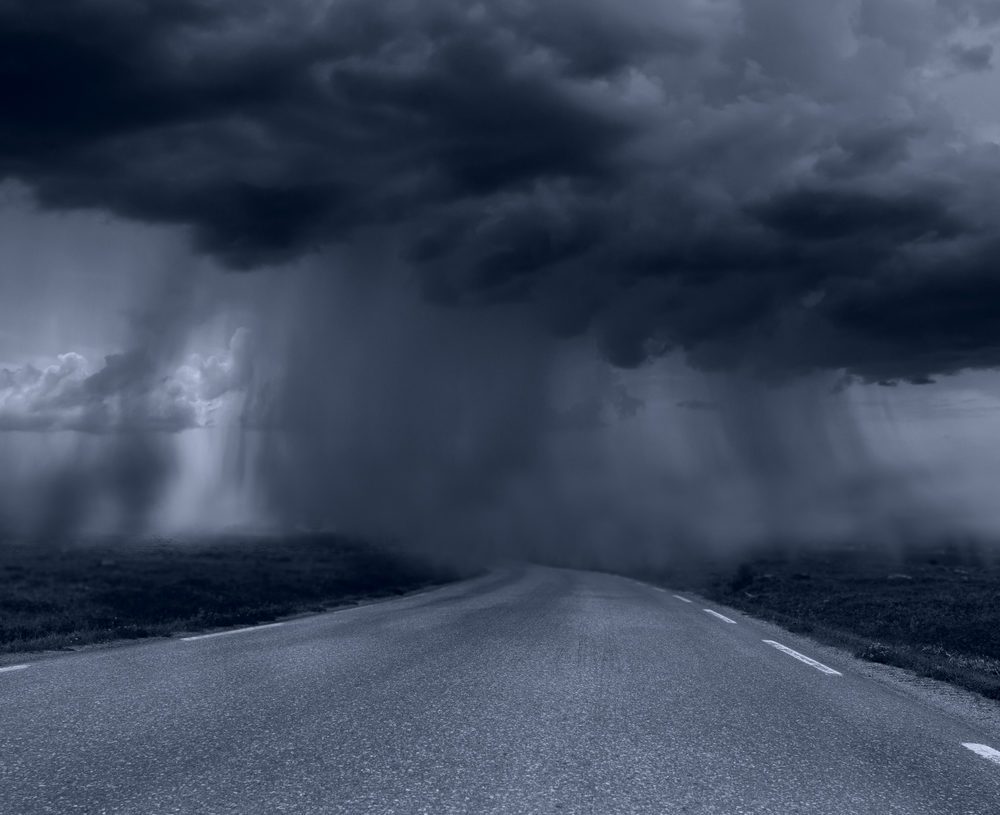 Empty roadway with strong storm approaching