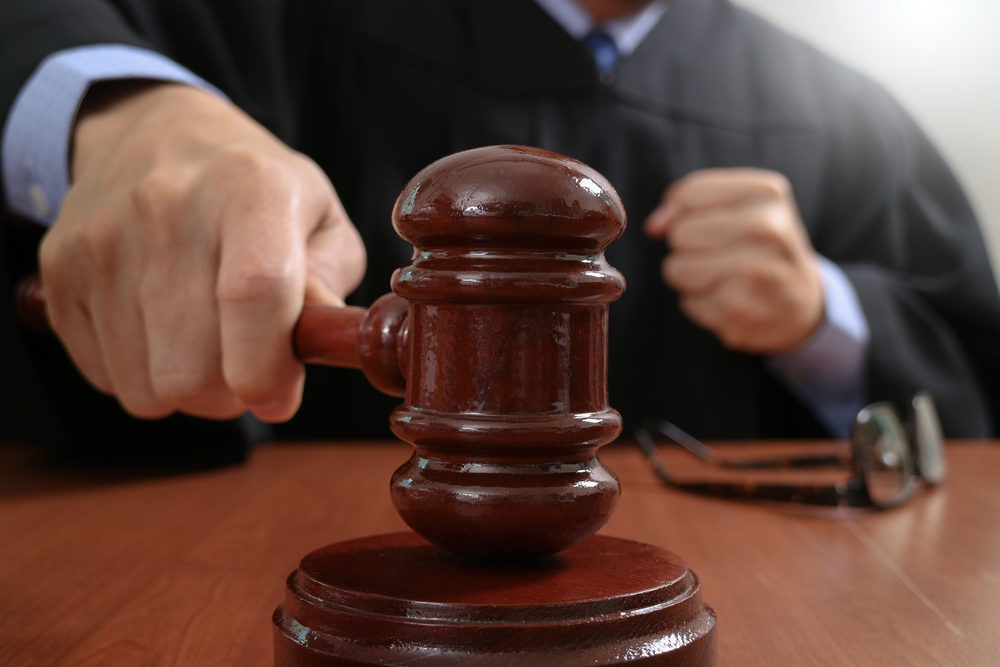 A judge striking a gavel