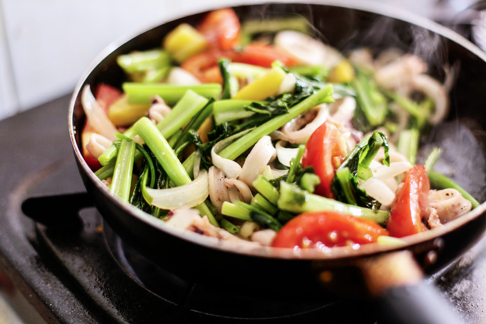 Food cooking in skillet