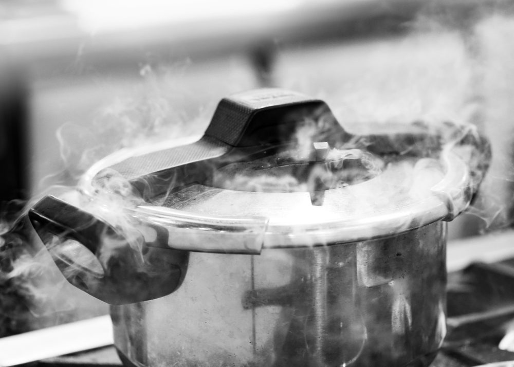 Pressure cooker steam over cooking in a Kitchen