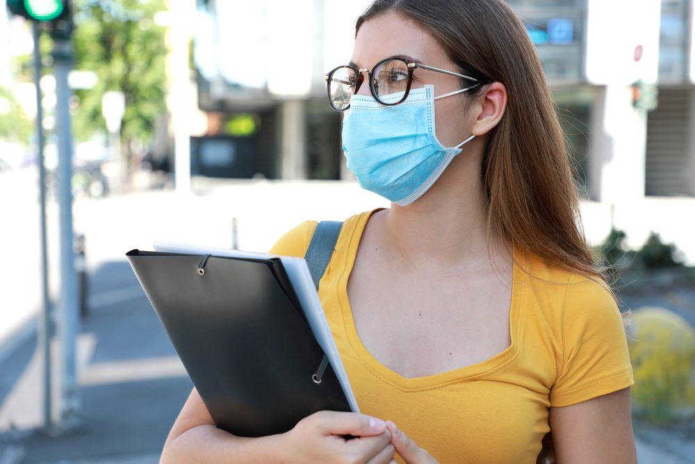 University Student Female with Surgical Mask Walking in City Street