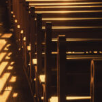 sunlight on empty catholic church pews