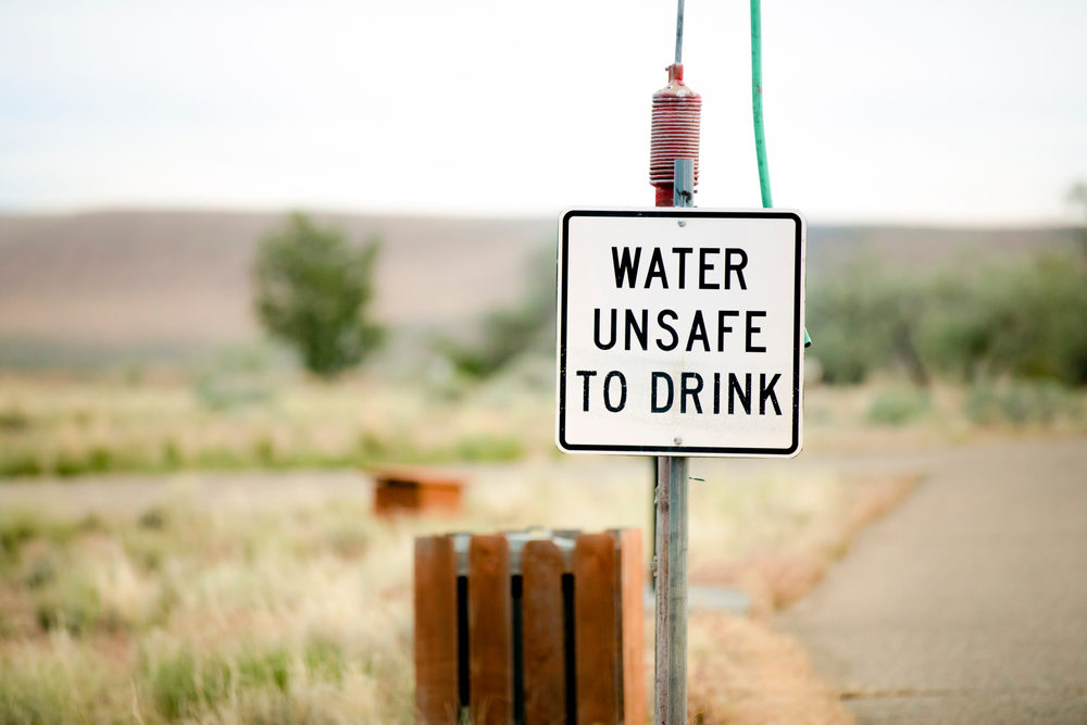 sign indicating that the water is not safe to drink at a camp site